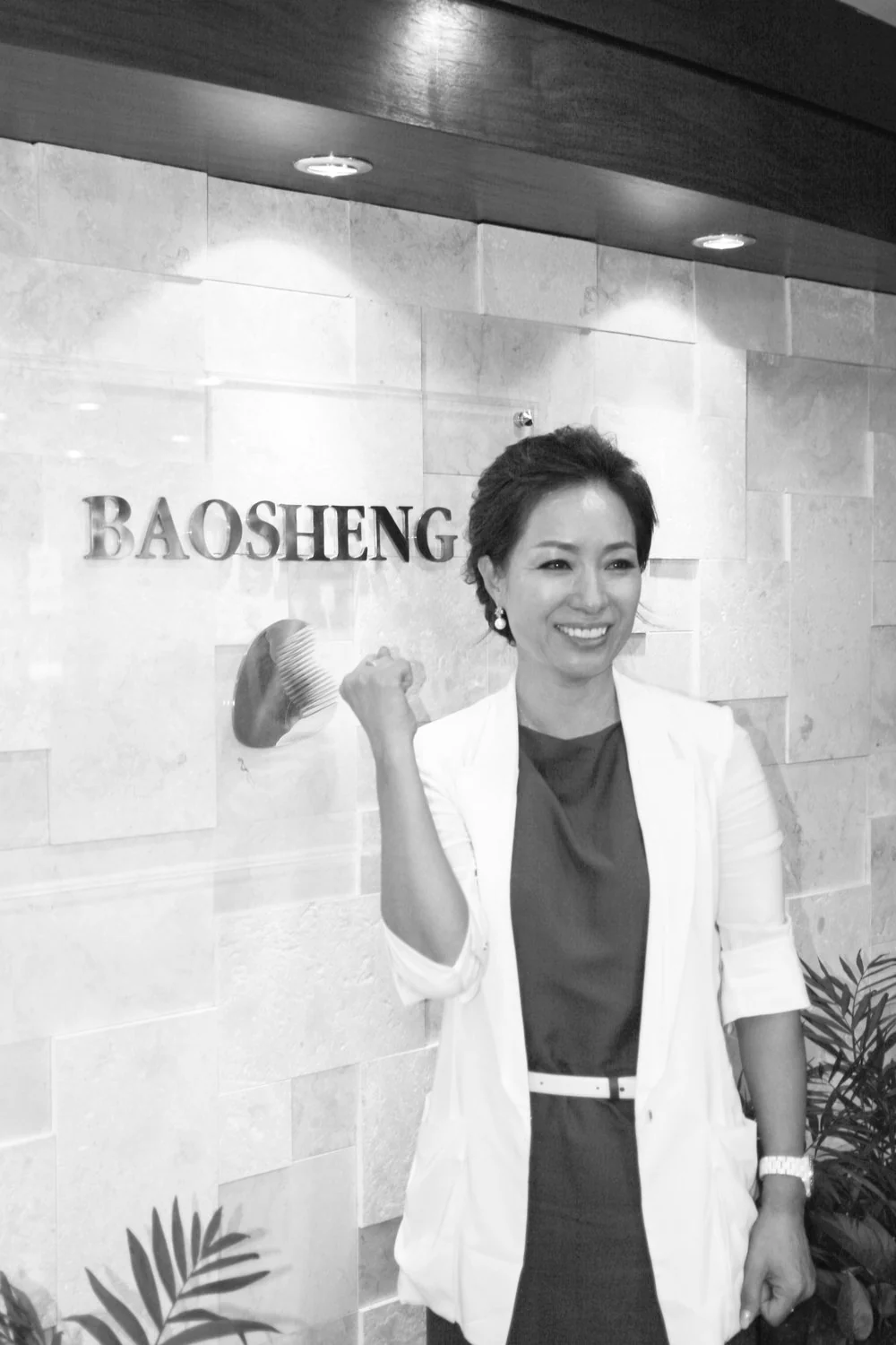 Saehee Lee, CEO, at the Baosheng company entrance, 2026