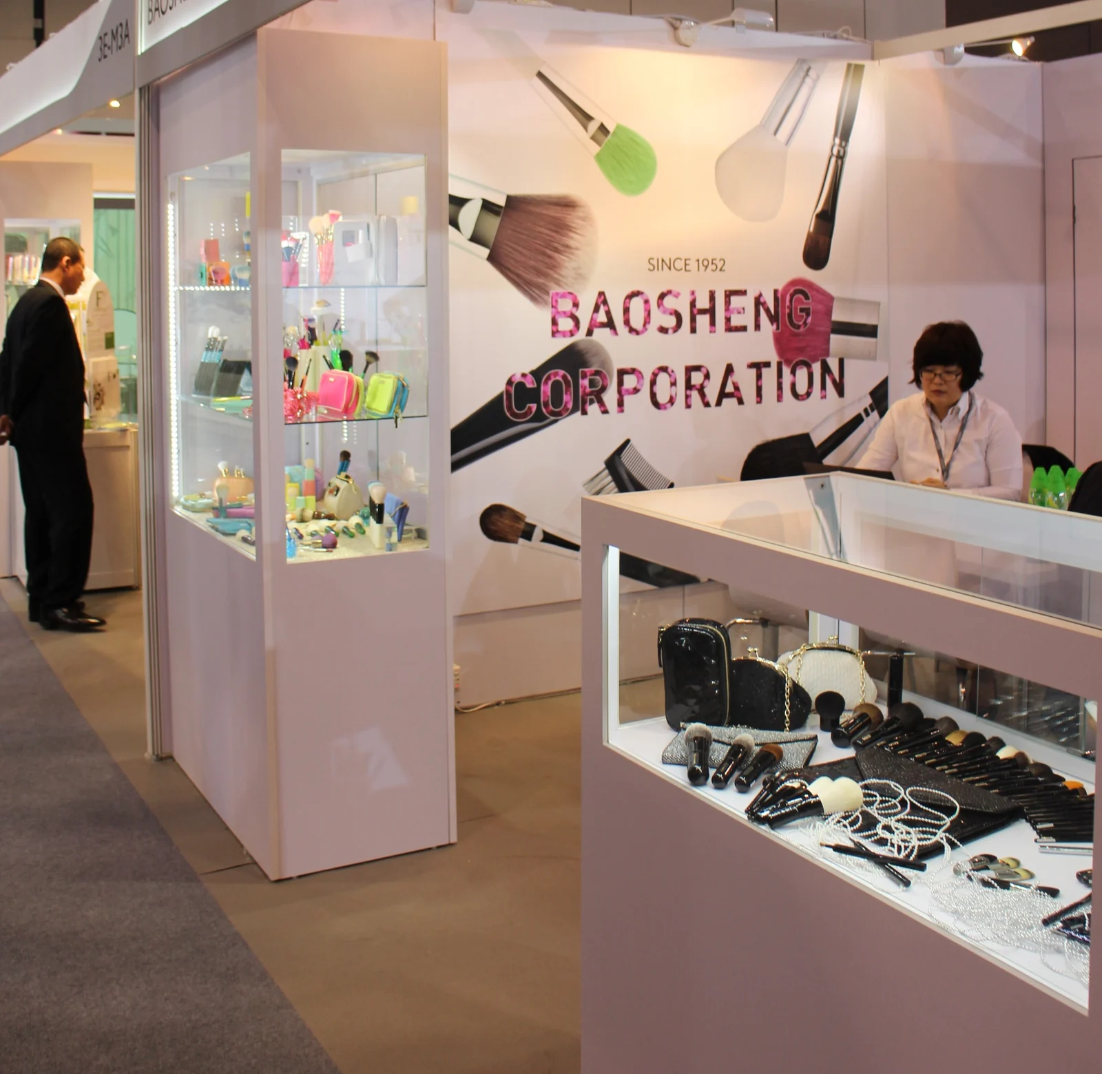 Baosheng Corporation stand with the brush-wall graphic, 2012