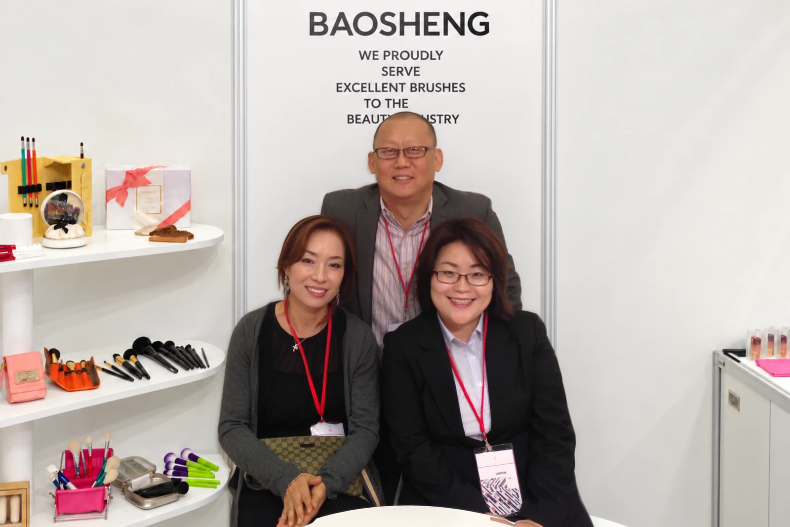 Saehee Lee, James Shin and Michelle at the Baosheng stand, 2013