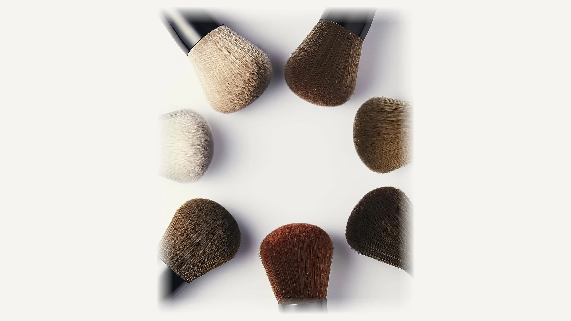 Seven kabuki brush heads in a ring