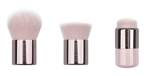 Three rose-gold retractable travel brushes